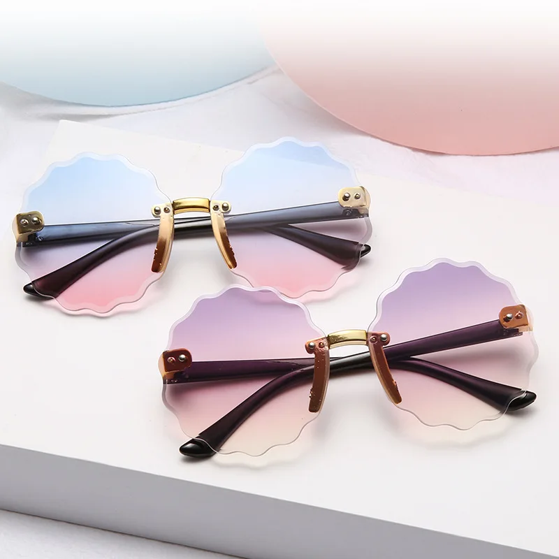 

2021 Stylish Rimless Children Flower Sunglasses Fashion Kid Round Pink Gradient Sun Glasses Boy Girl Goggle UV400 Wave-like Edge