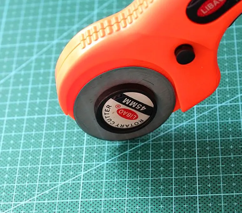 Высококачественный полезный безопасный вращающийся резак для резки ткани шитья