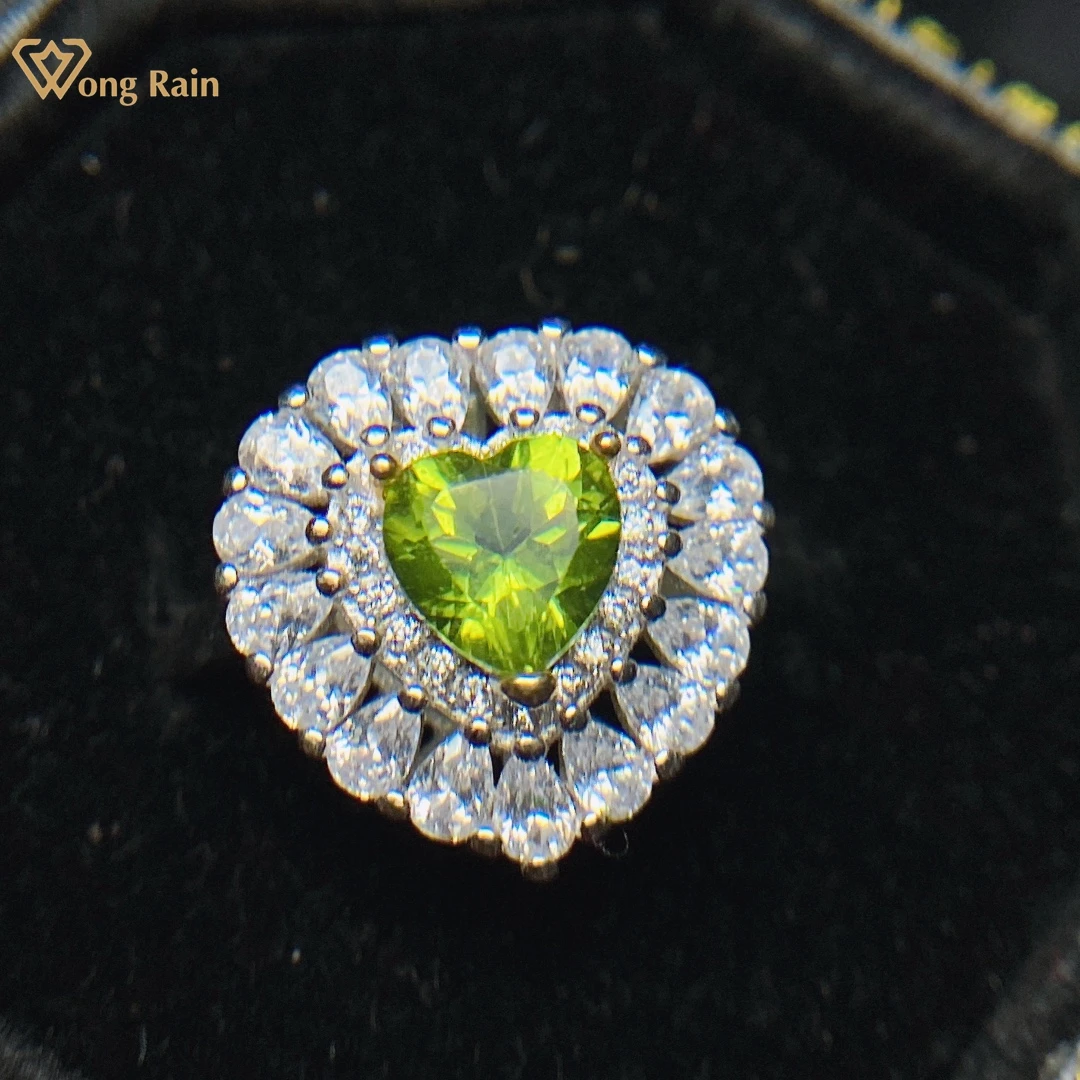 

Wong Rain 925 пробы, серебряное кольцо в форме сердца, натуральный Перидот, создан из моиссанита, драгоценный камень, вечерние женские кольца, юве...