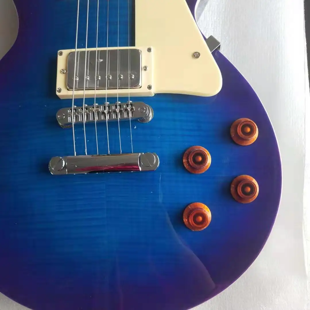 

Encargo al por mayor de alta calidad guitarra elctrica estndar guitarra elctrica Parte superior de arce flameado... envo gr