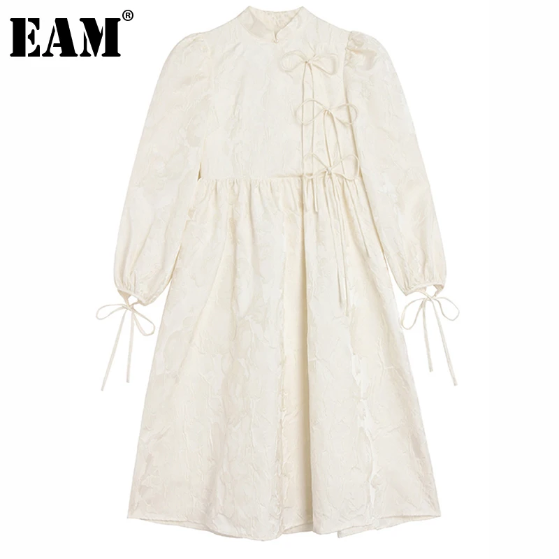 

[EAM] женское бежевое Элегантное Длинное платье с бантом, новое модное свободное платье с воротником-стойкой и длинным рукавом, весна-осень 2022...