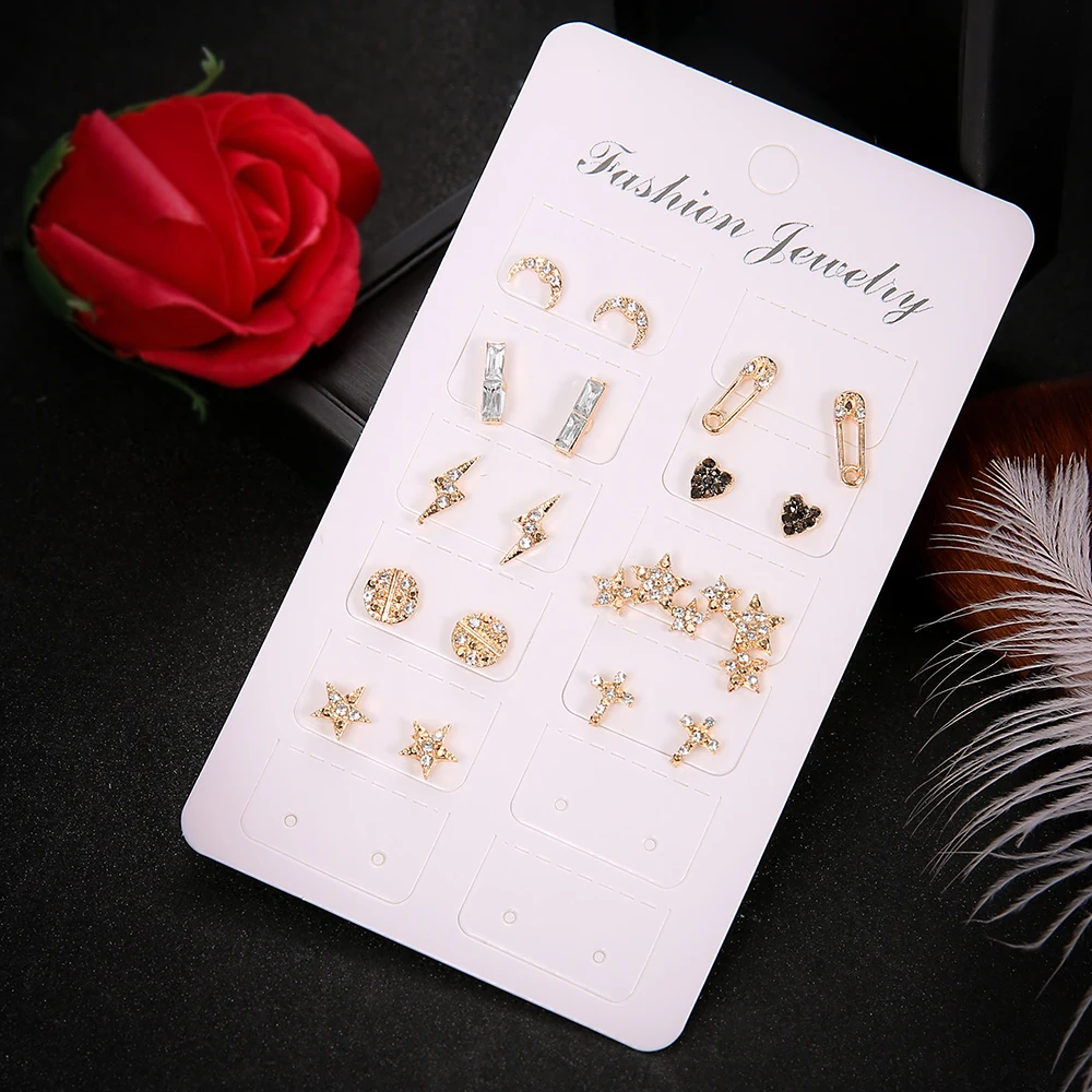 

Frauen Mode Sterne Mond Kreuz Kristall Herz Gold Stud Ohrringe Set Punk Temperament Schmuck Zubeh