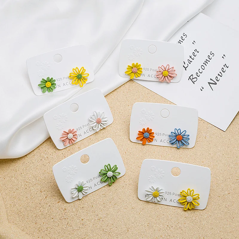 

S925 Earrings asymmetrical Daisy lovely personality earrings female hollow-out flower girl sen is an exquisite gift lucky