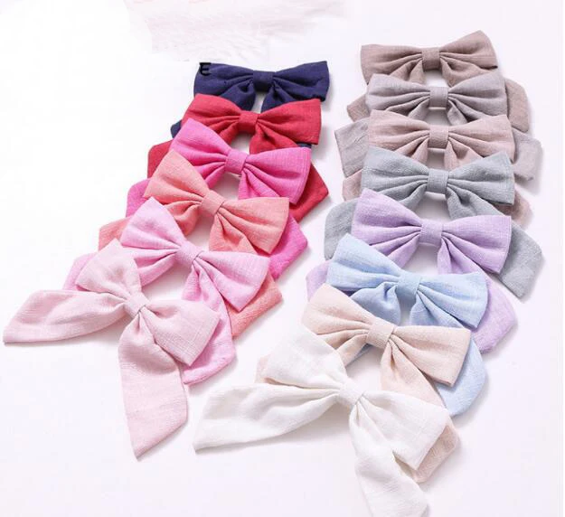 

50pcs/lot Fashionable Candy-colored Female Children Bow Cotton And Hemp Christmas Bows Party Gifts For Children
