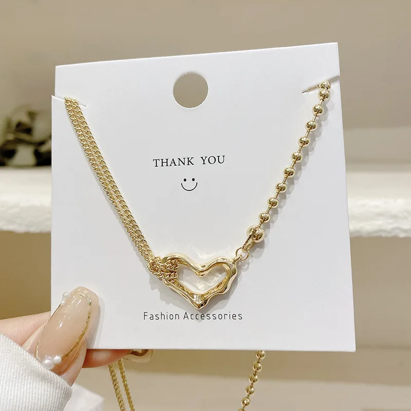 

Korean fashion personality irregular knotted love necklace female retro wild clavicle chain
