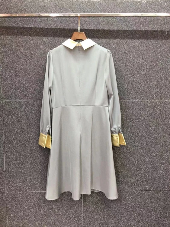

2021 early spring new women's cuff color matching flannel symmetrical pocket long-sleeved dress 303