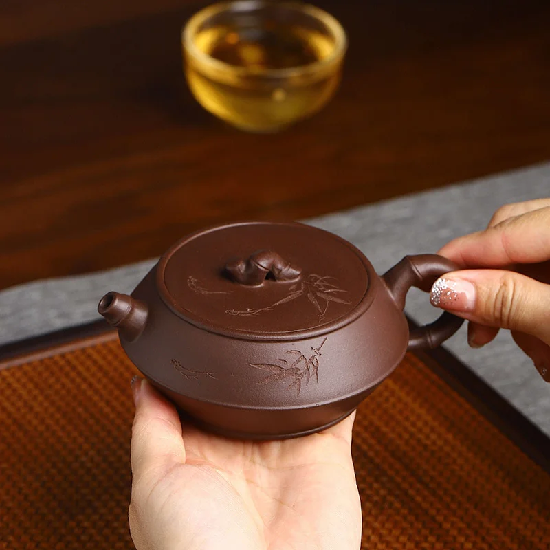 

Yixing raw mine Purple mud bamboo drum bamboo knot purple sand pot Chinese carved bamboo leaf teapot Kung Fu Tea Set