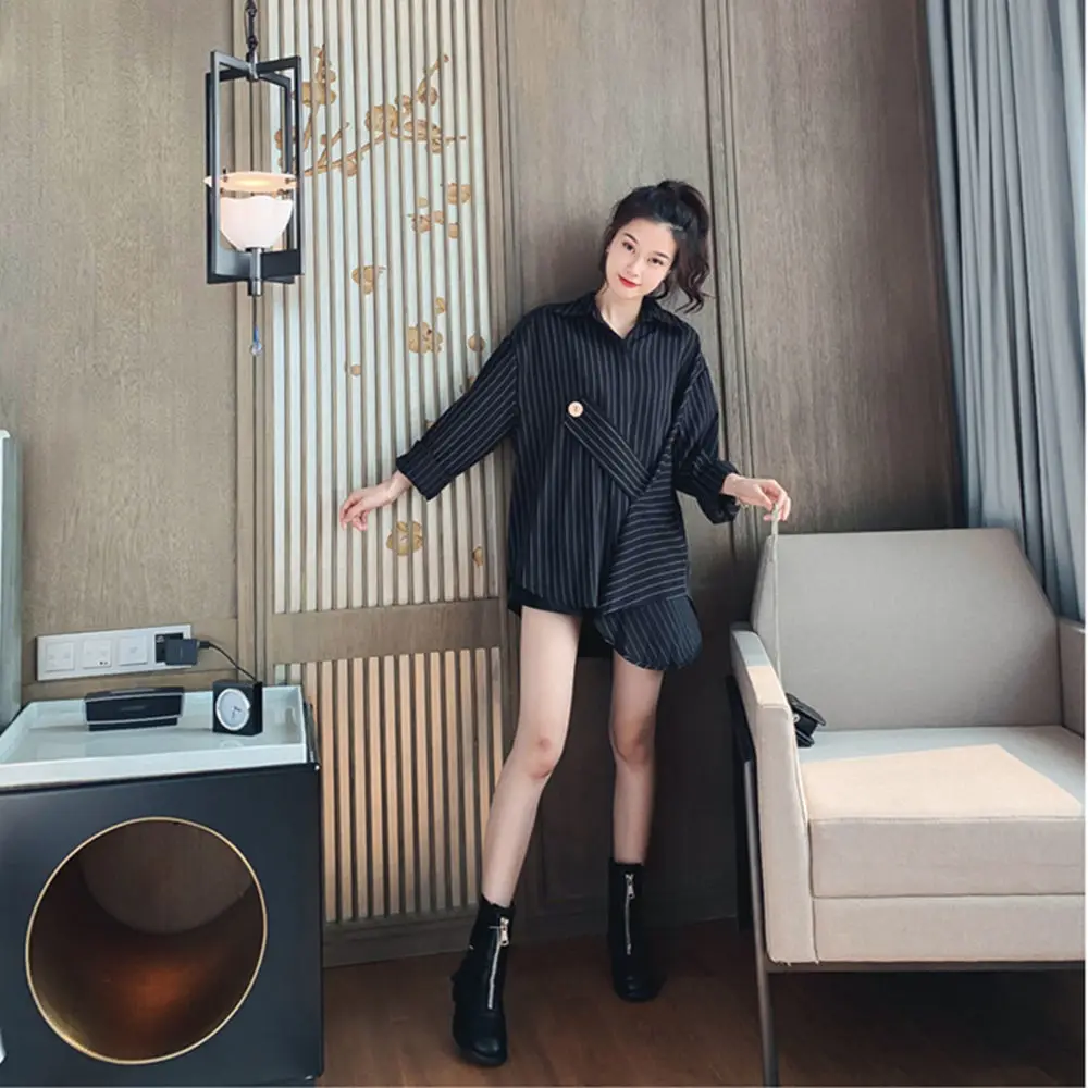 

Striped shirt women's design niche 2021 spring and autumn new loose medium length irregular foreign style shirt