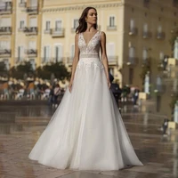 boho shining v neck wedding dresses 2021 a line wedding gown lace appliques backless sleeveless tulle vestido de noiva 2021