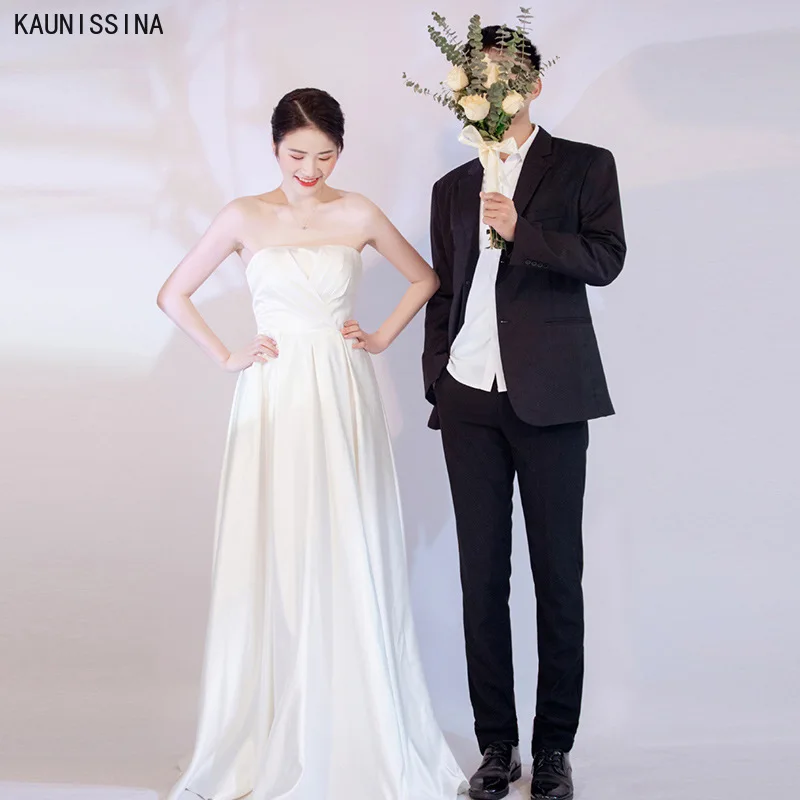 

Свадебные платья-трапеции для невесты, без бретелек