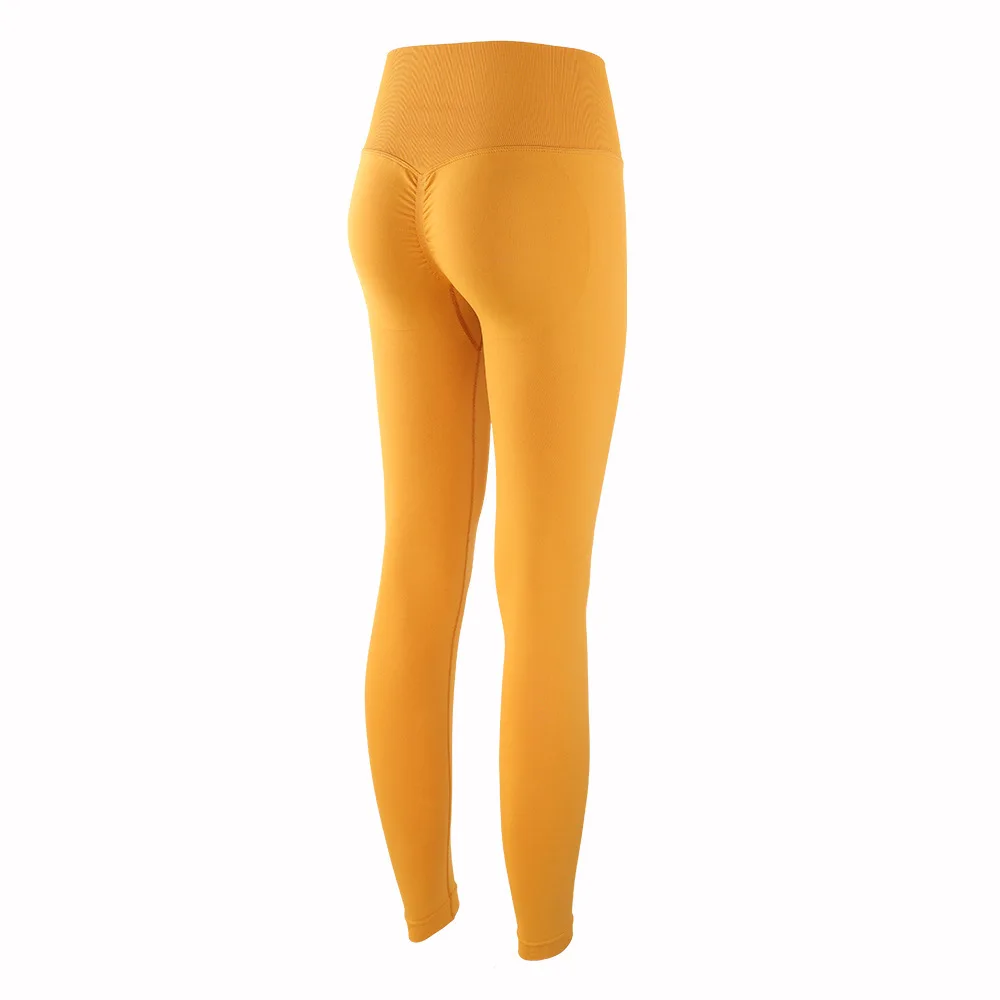 2021 Hot women's high-waisted peach hips nude yoga pants foreign trade new seamless hip-lifting fitness pants