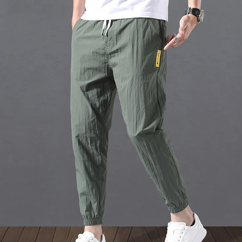 

High Quality Mens Cotton Linen Pants Drawstring Waist Mid Waist Pocket Loose Pencil Pants Casual Harem Sweatpants Trousers