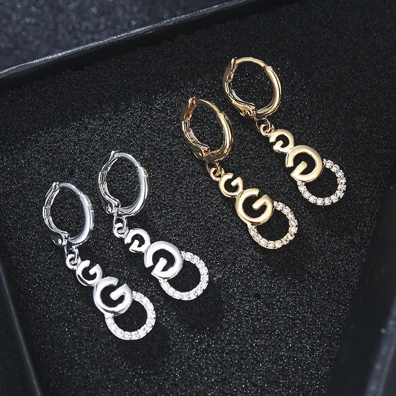 Микровставки из кубического циркония и вышитой буквой G серьги для женщин