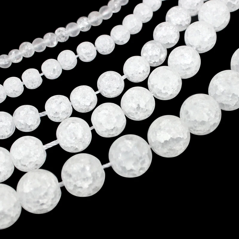 Тусклые блестящие матовые белые снежные треснувшие фонарики круглые бусины