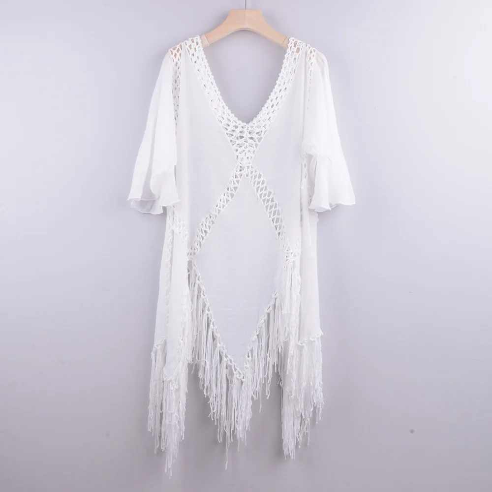 

WILK 2021 new knitting irregular hollow out hand hook stitching is prevented bask in coat coat tassel bikini beach blouse