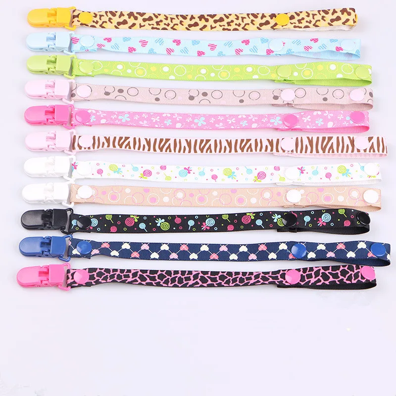 

1pcs Baby Pacifier Cute Baby Clips Chain Dummy Clip Nipple Holder Nipples Children Cartoon Dot Pacifier Clip Soother Holder
