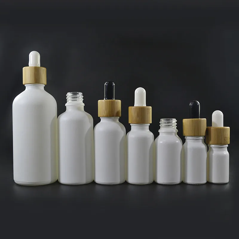 

297pcs 30ml matte white glass dropper bottle with bamboo cap 1oz glass essential oil bottle e liquid bottle Cosmetic Containers