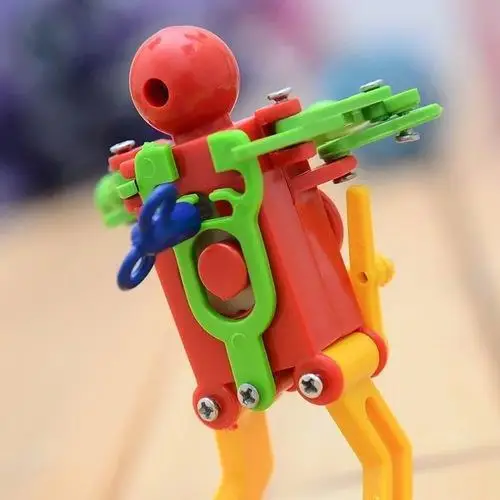 Новый продукт - креативная заводная игрушка-робот, танцующая и крутящаяся, детские образовательные игрушки горячего вечернего рынка.