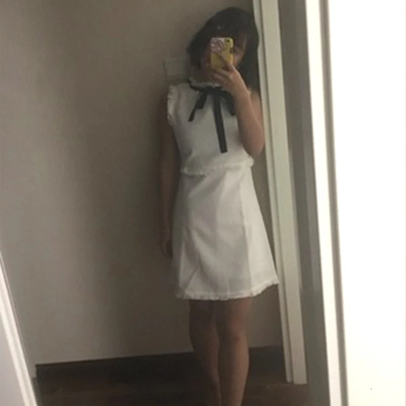 HDY Haoduoyi летнее милое стильное платье без рукавов с бантом и кисточками для молодых девушек Новое поступление однотонное белое мини-платье выше колена для женщин