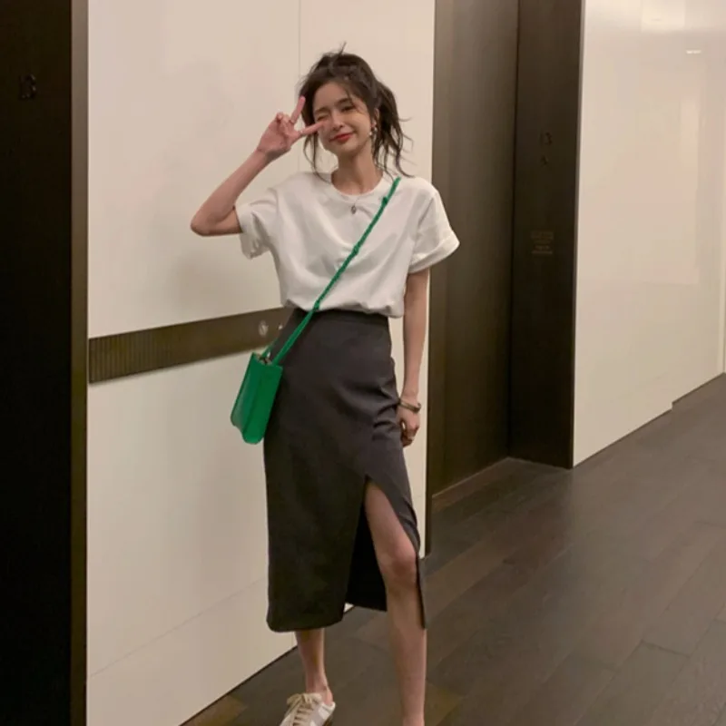 

Весенняя Асимметричная юбка с высокой талией для женщин в Корейском стиле в стиле преппи с разрезом облегающая юбка средней длины с цветочн...