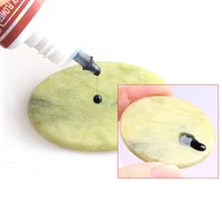 unique round jade stone eyelash extension glue adhesive pallet stand holder eyelash extension glue pads stand on eyelash plastic