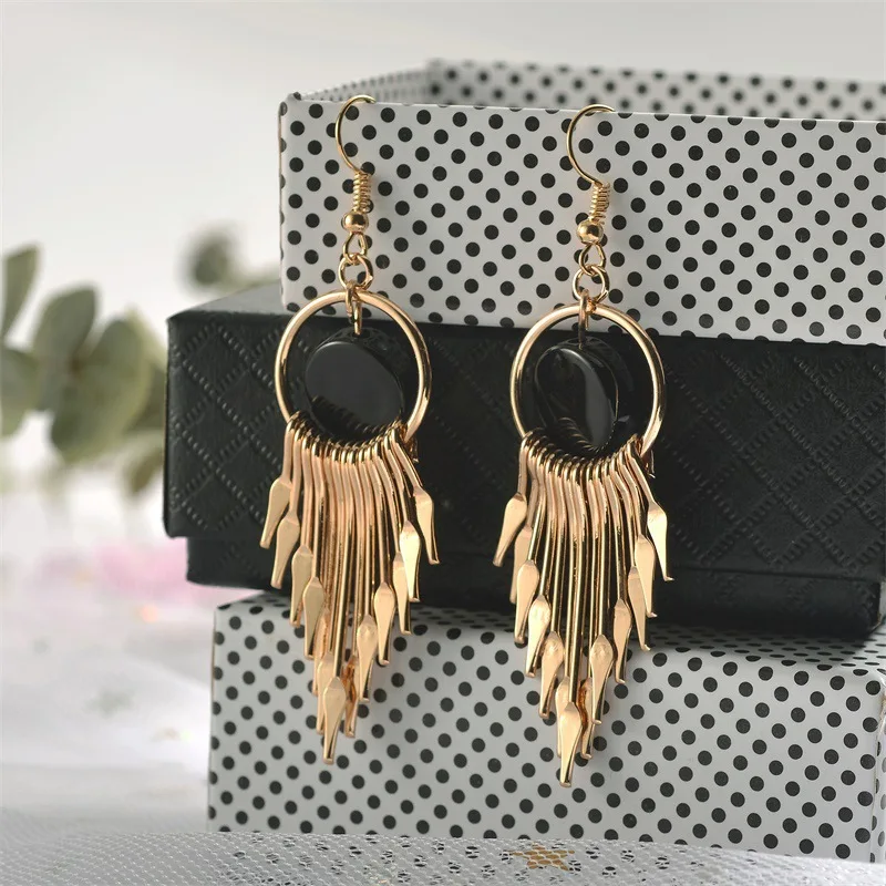 

Korean version of tassel geometric earrings temperament net red long round pendant Japan and South Korea elegant retro goddess e