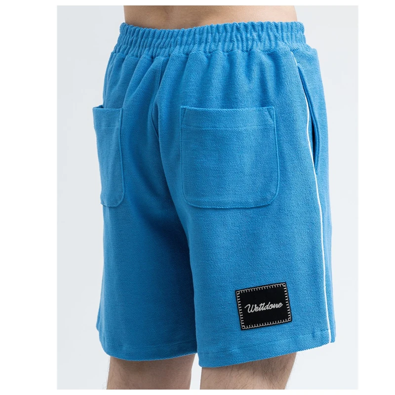 

Street style we11done 2021 New embroidered LOGO beach shorts men's welldone high street hip hop loose casual shorts for women