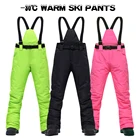 Лыжные брюки для женщин и мужчин, спортивные уличные высококачественные ветрозащитные водонепроницаемые теплые зимние брендовые зимние брюки для сноуборда