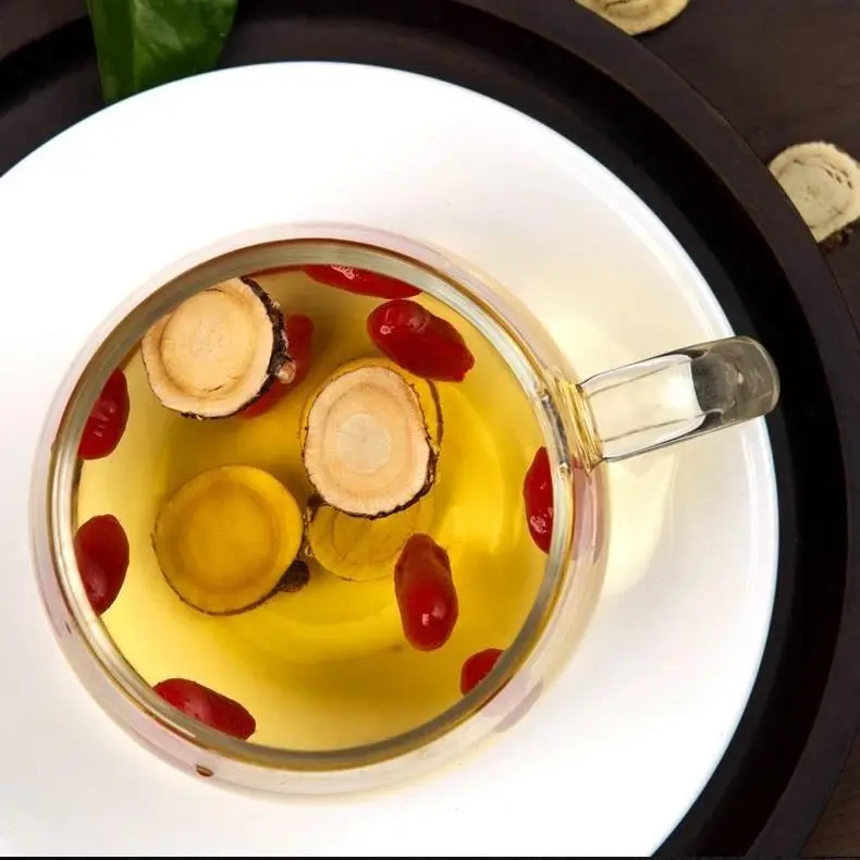 

Licorice Tablets Soaked in Water Bottled Hay Powder Tea Traditional Chinese Medicine Astragalus Tea