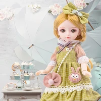 new bjd 26cm doll 3d eyes 13 joints movable 8 points fashion travel suit doll diy play house dress up girl toy childrens gift