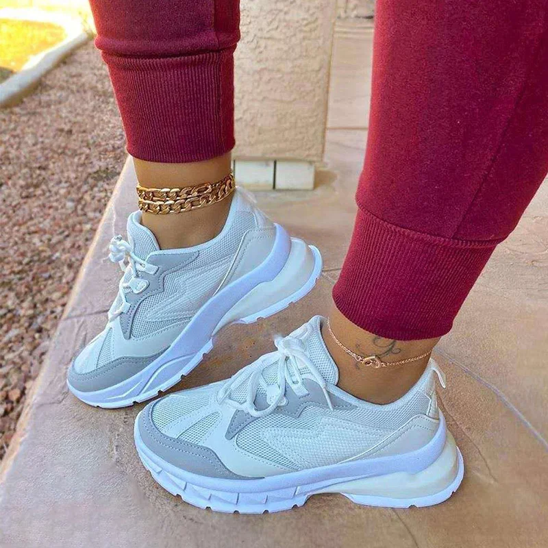 Женские кроссовки на не сужающейся книзу массивной платформе Женская