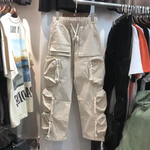 2021 New High Quality Travis Scott Tooling Multi Pocket Drawstring Casual Pants For Men And Women Tr in USA (United States)