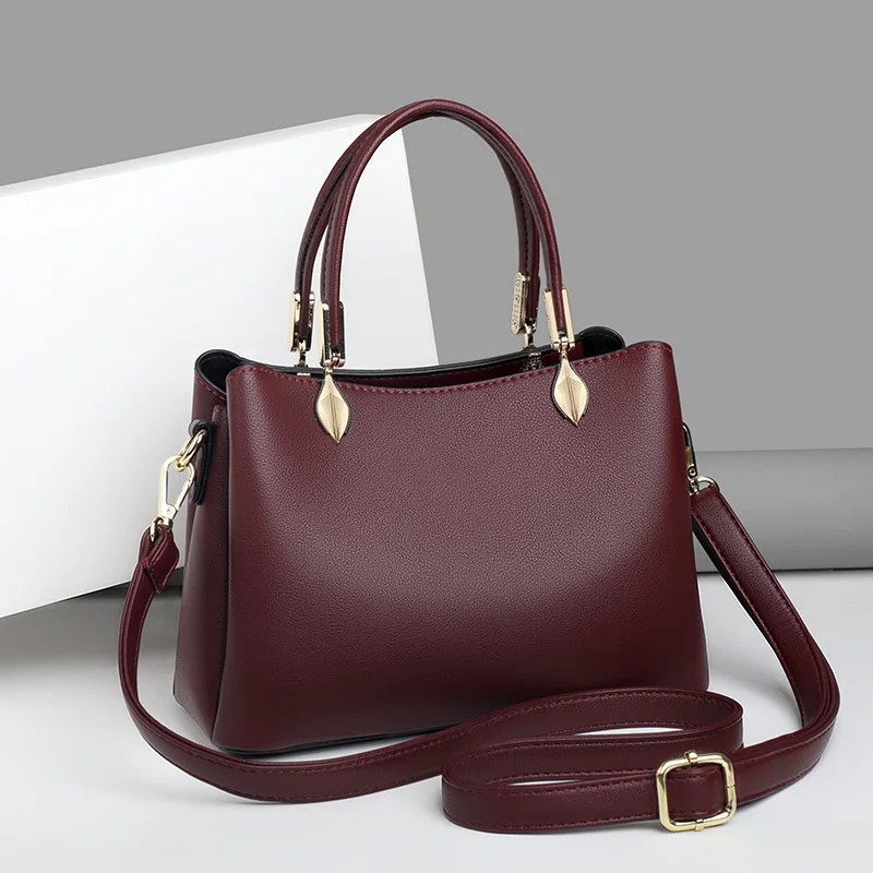 

202 new autumn and winter women's solid color handbag women's large capacity atmospheric middle-aged mother's bag fashion