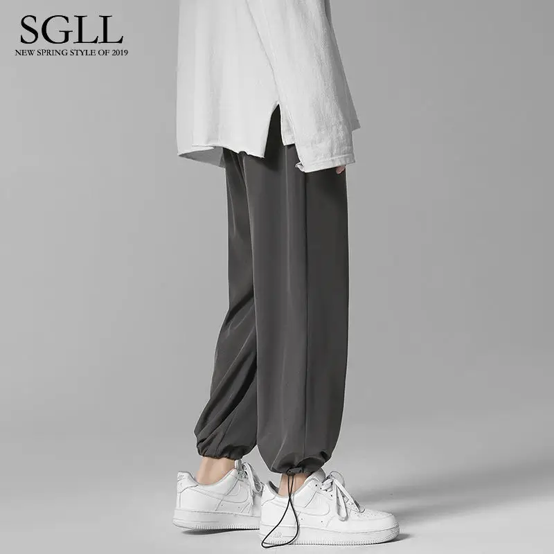 

Ice silk casual pants for men summer thin Korean fashion wide leg straight leg loose nine point sports leg pants M-3xl
