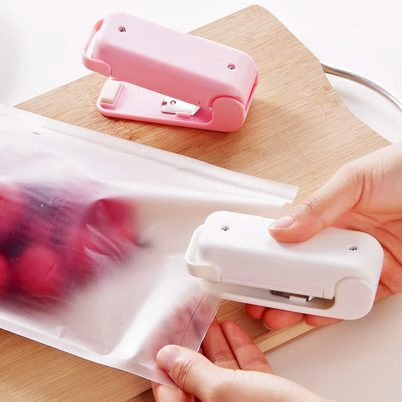 

Portable Heat Plastic Sealer Package Storage Bag Mini Sealing Machine Handy Sticker Seals Food Snack Kitchen gadget Accessories