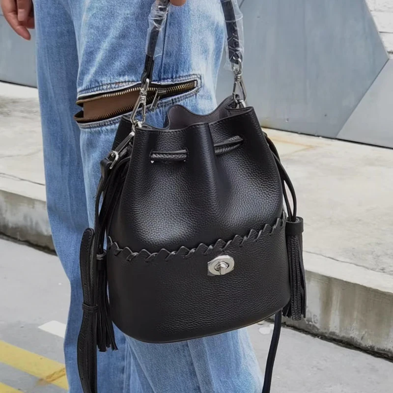 

Leather bucket bag tassel armpit bag drawstring female bag messenger bag shoulder bag new 2020 first layer cowhide