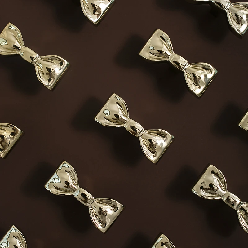 

Furniture bow high-end solid pure brass silver plating fadeless Italian furniture drawer small handle