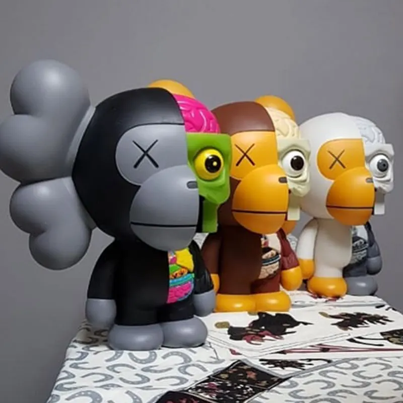 

KAWS Ape Man 19CM Half Skull Body Dissection Anime Figures Monkey Model PVC Hot Trendy Ornaments Toy Kawaii Room Decoration Doll