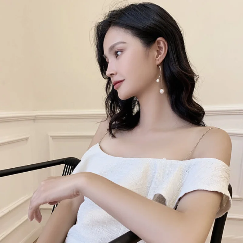 

Long Size Pearl Spiral Pendant Earrings Female Face Thin Personality Ear Line Wave Design Sense Tassel Ear Jewelry