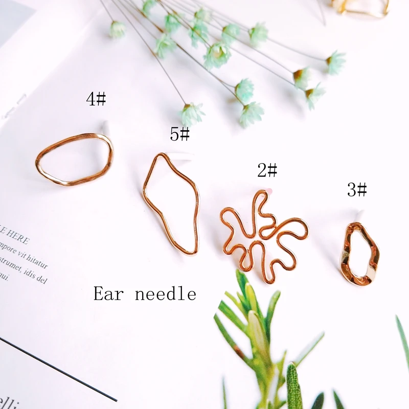 Серьги гвоздики нестандартной геометрической формы ювелирные украшения из