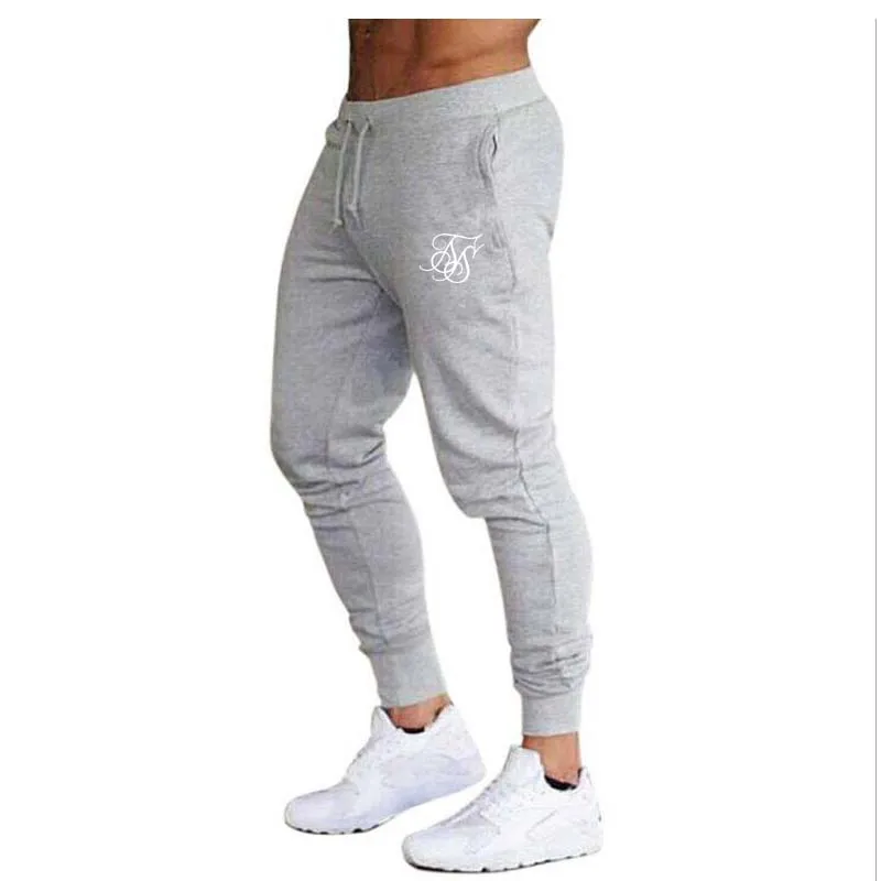Брюки мужские для фитнеса Брендовые повседневные эластичные штаны одежда