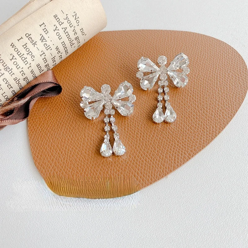 

LOVOACC Luxury Full Bling Bling Rhinestone Cross Knotted Pendant Earrings for Women Ladies Long Bowknot Earrings Accessories