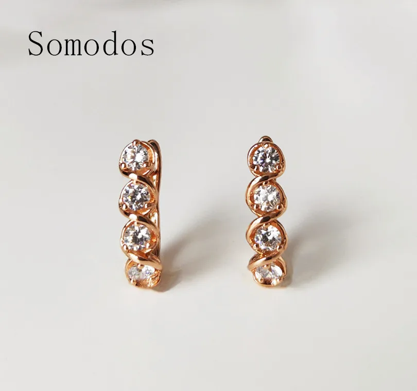 Серьги-гвоздики из розового золота 585 пробы с инкрустацией циркона праздничный