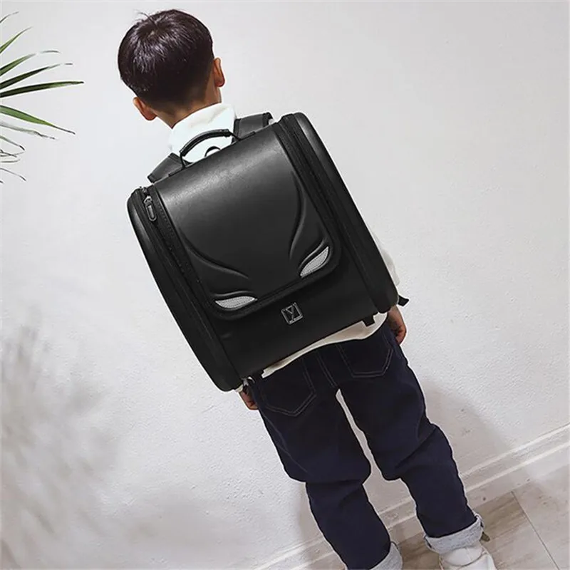 

NEW Orthopedic Children School Bags For Girls and boys Kids Monster eye Backpack Japan waterproof PU Book Bag