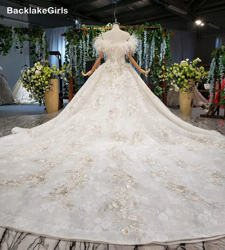 Высококачественные свадебные платья с перьями 2020 Новая мода Сексуальная Лодка