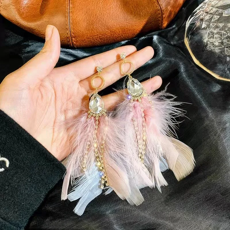 

Silver needle super fairy long feather earrings temperament personality net red earrings exaggerated atmosphere free shipping