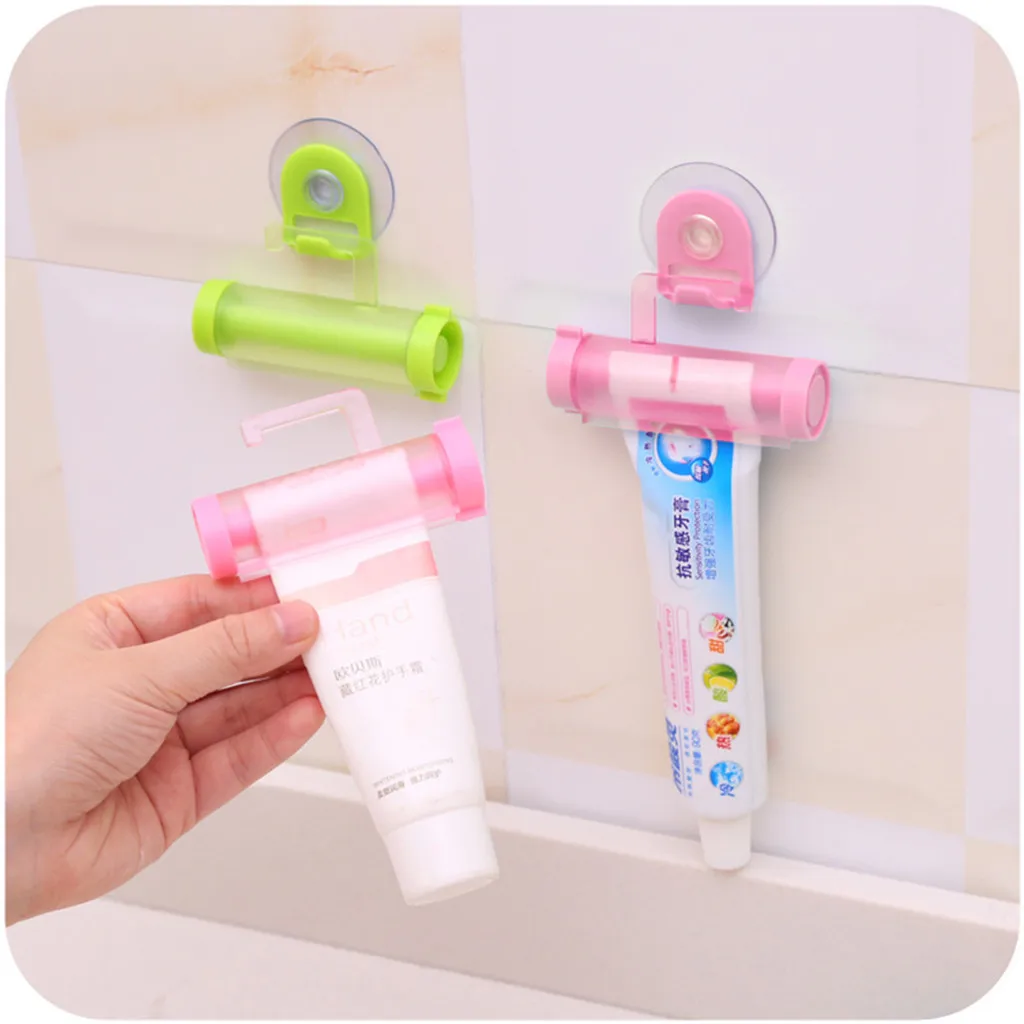 

New Creative Rolling Squeezer Toothpaste Dispenser Tube Sucker Hanging Holde Distributeur Dentifrice Bathroom Accessories #864