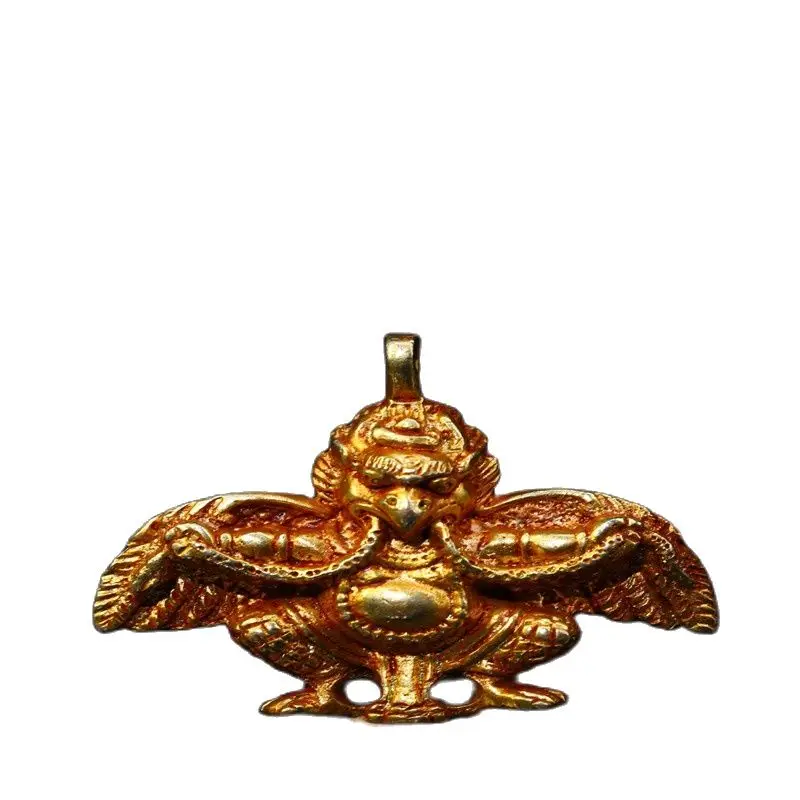 

Early collection of Nepalese gilt roc bird pendants