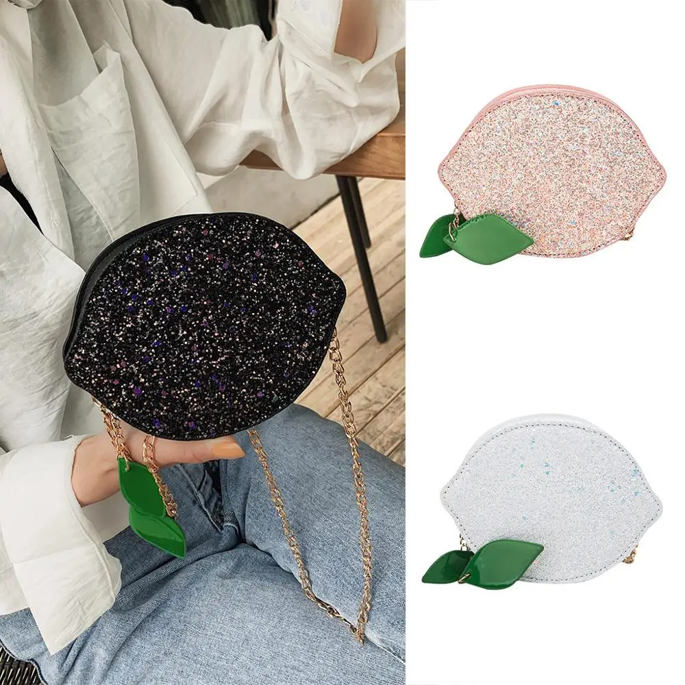 Женская сумка через плечо блестящая лакированная кожа лимон круглая цепь