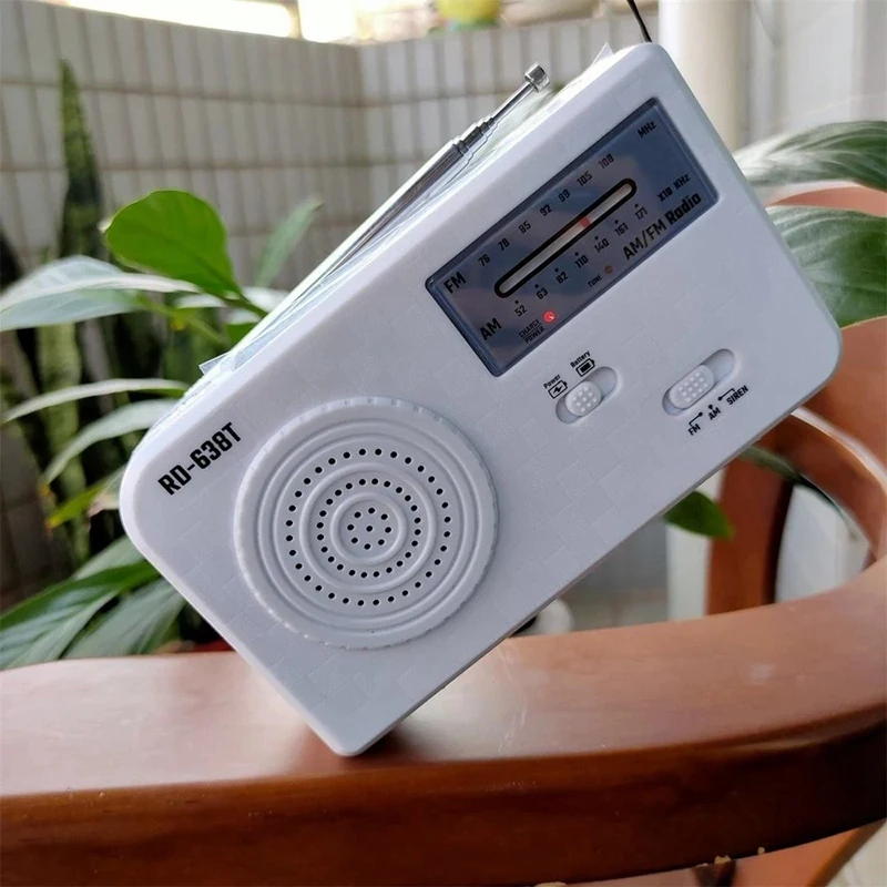 

Multiple Use Solar Powered or Power Generation By Hand FM AM Radio with 1LED Flashlight USB Emergency Charger